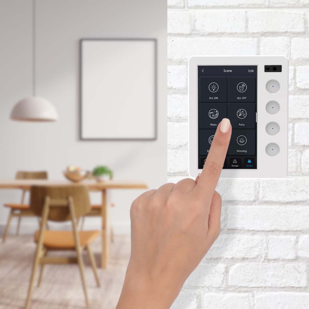 PIXIE Ambience Touch Panel mounted on a wall showing the touchscreen interface